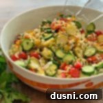 Greek Cauliflower Rice Salad with Brussels Sprouts in a salad bowl