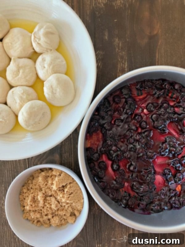 Caramelized Blueberry Upside-Down Rolls 7 Blueberry Sweet Rolls Prep: Blueberry pie filling is spread evenly into a round cake pan lined with a Silpat mat, ready for the dough.
