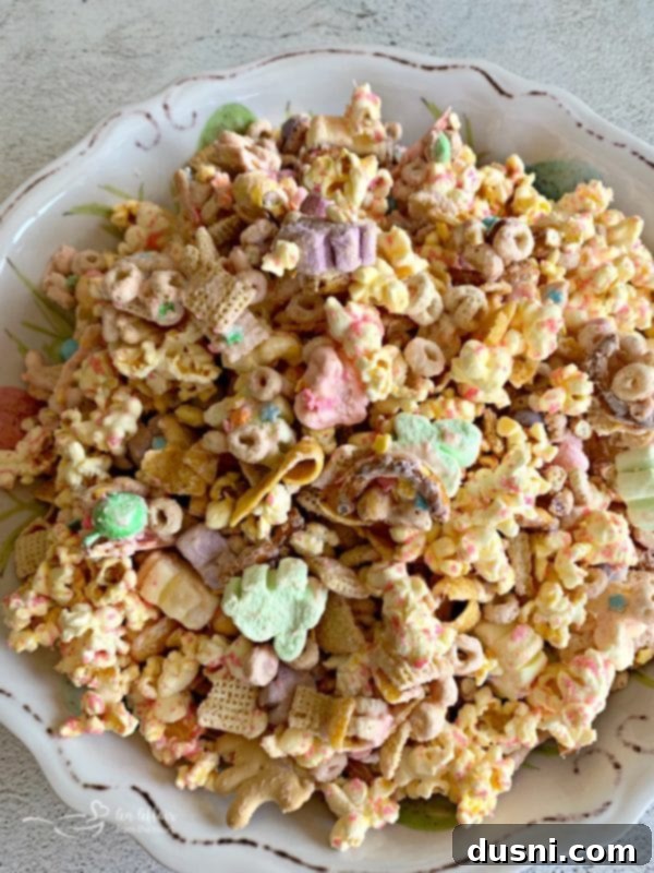 Springtime Sweet Crunch Medley 2 Vibrant Spring Candy Coated Snack Mix in a white bowl