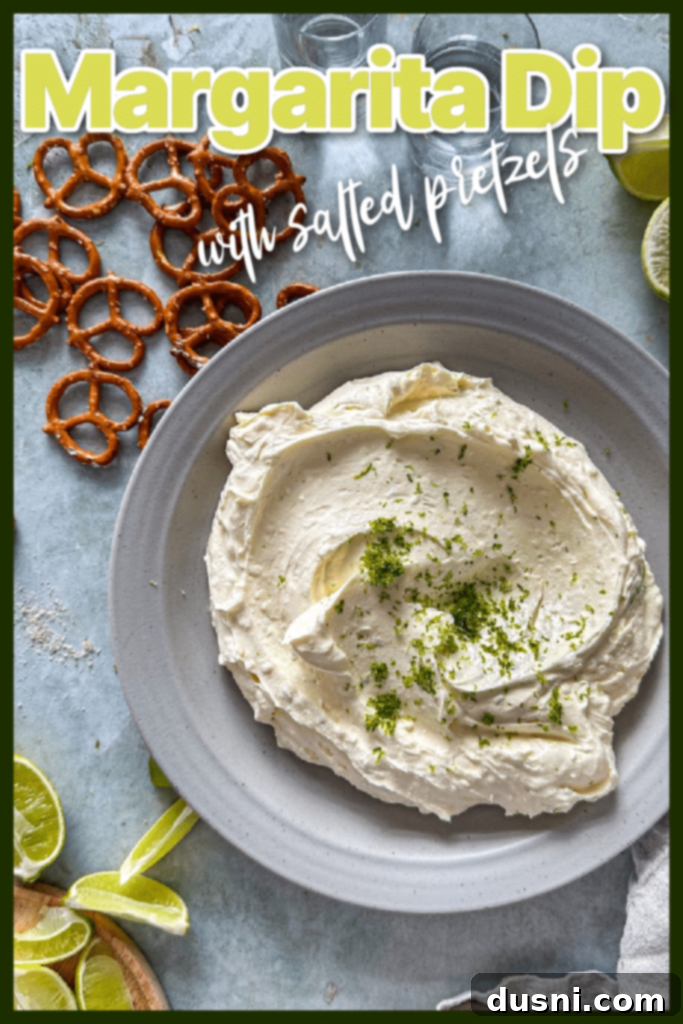 Ultimate Margarita Pretzel Dip 12 Margarita Dip served in a small bowl, garnished with lime zest, with pretzels on the side.