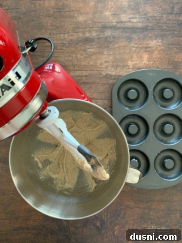 Preparing the batter for Baked Powdered Sugar Donuts