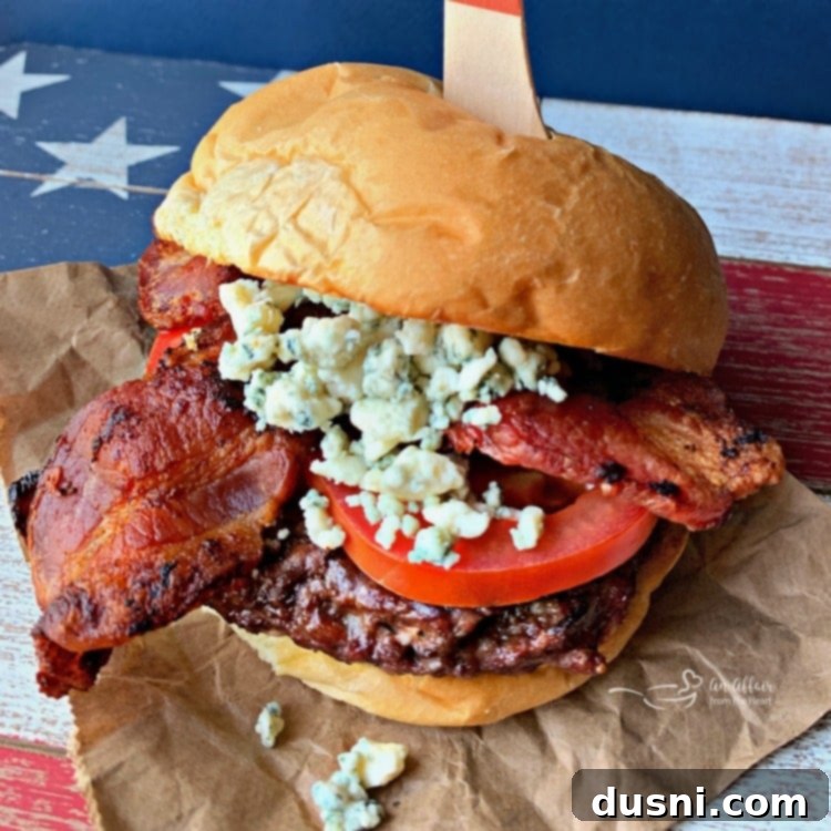 The final Red, White & Bleu Burger, assembled with all toppings and ready to be enjoyed.