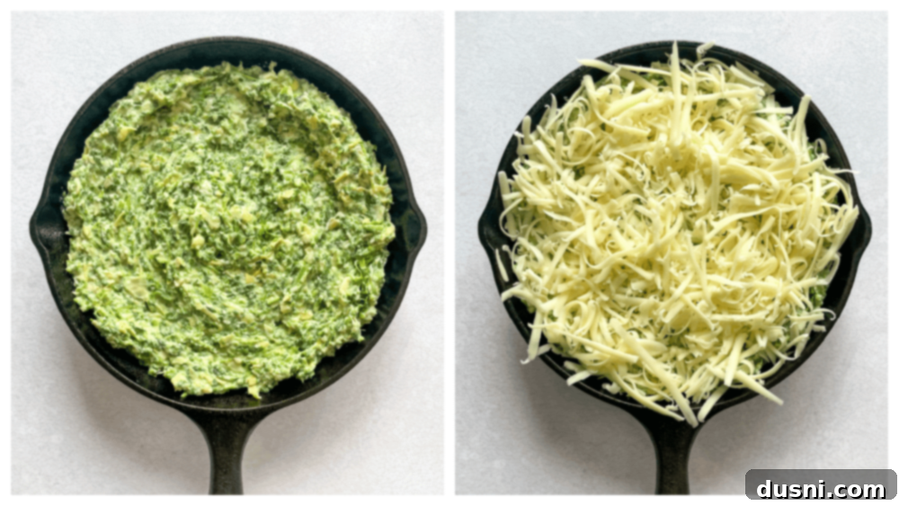 A mixing bowl filled with the creamy spinach artichoke dip mixture, before being transferred to a baking dish.