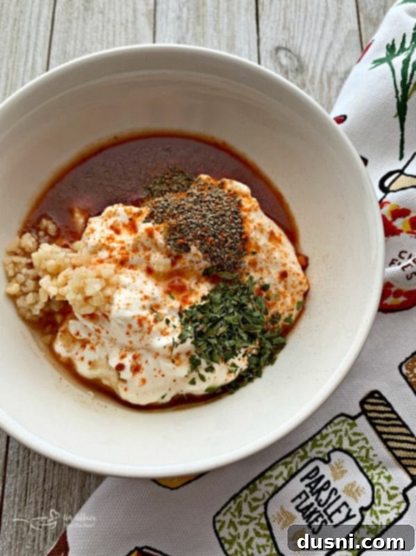 Bloody Mary's Savory Stack 4 Ingredients for Bloody Mary Aïoli mixed in a white bowl, ready for blending.