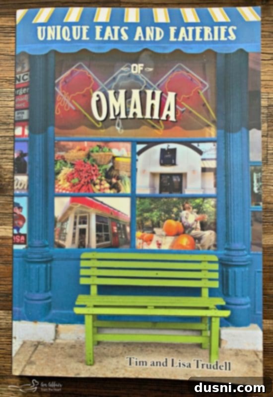 Cover of the book 'Unique Eats and Eateries of Omaha' by Tim and Lisa Trudell.