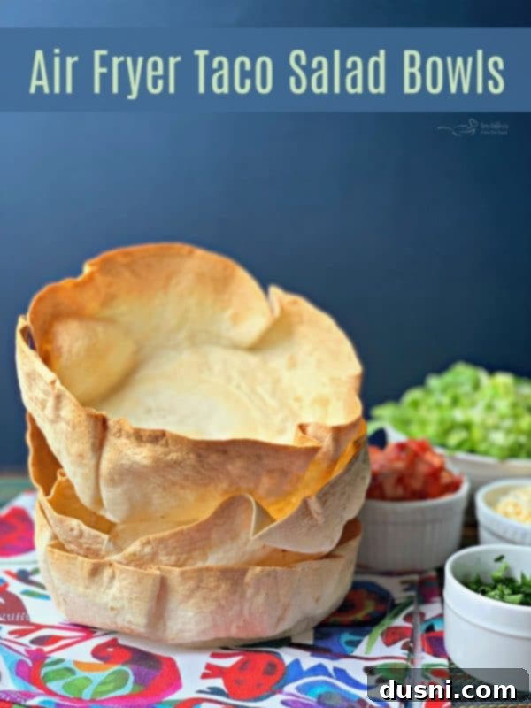 Crispy Air Fryer Taco Salad Bowls 10 Air Fryer Taco Salad Bowls filled with vibrant salad ingredients