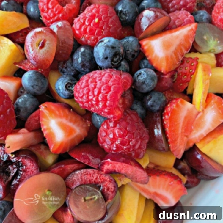 Summer Fruit Salad with Honey Lime Poppy Seed Dressing close up view