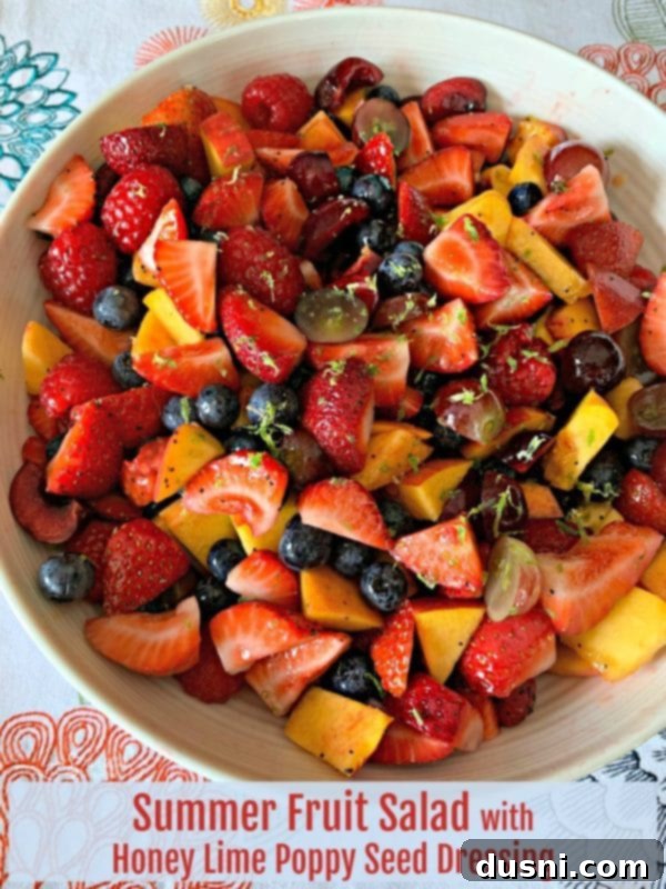 HERO image of Summer Fruit Salad with Honey Lime Poppy Seed Dressing
