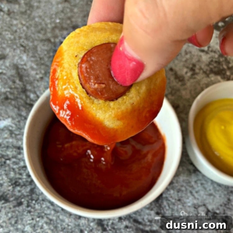 Corn Dog Muffin Bites 3 Corn Dog Mini Muffins dipped in ketchup