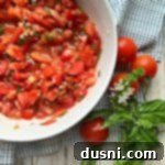 Overhead of Tomato Bruschetta in a white bowl