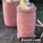 Violet Cream Dream 13 Two glasses of purple cow smoothie will whipped cream and sprinkles