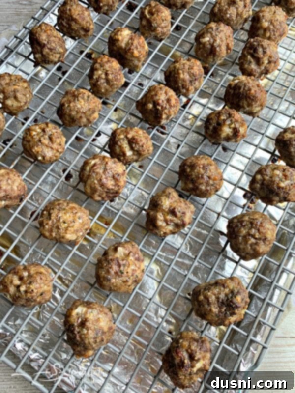 Baked Italian Meatballs on a wire rack after cooking