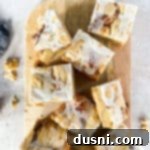 Iced snickerdoodle cookie bars on a wood board