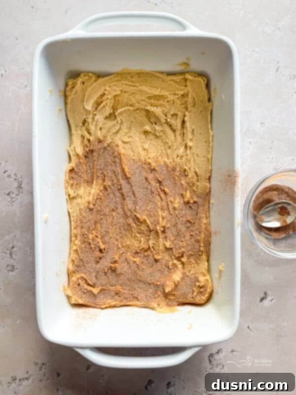 Glazed Snickerdoodle Bars 9 Mixing cinnamon and sugar for the snickerdoodle bar filling.