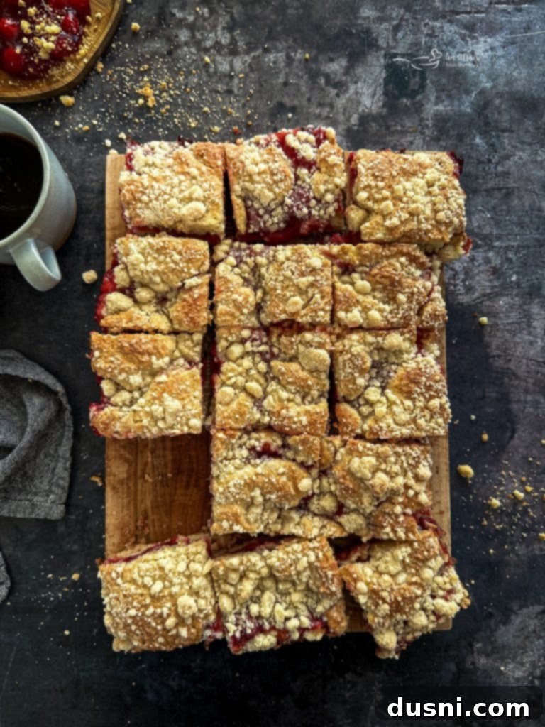Cherry Streusel Coffee Cake 11 Freshly baked cherry coffee cake with golden crumb topping