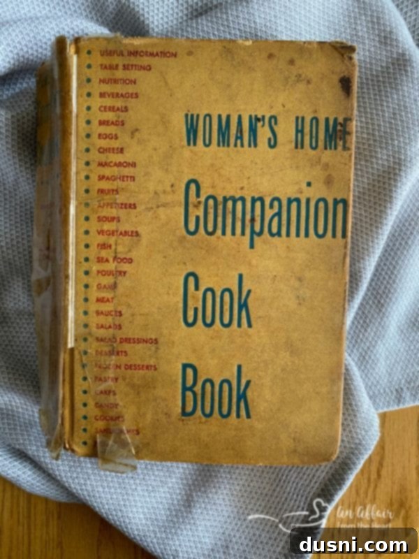 Grandma Martin's vintage cookbook, featuring a well-loved, worn exterior