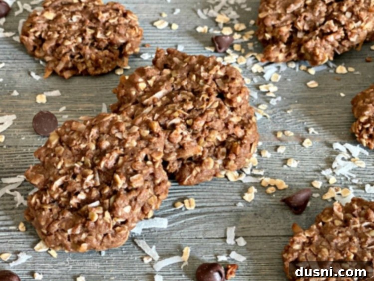Horizontal shot of freshly baked Chocolate Oatmeal Coconut Cookies cooling on a wire rack