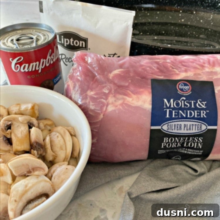 Four simple ingredients for Fuggedaboutit Pork Roast: pork loin, cream of mushroom soup, onion soup mix, fresh mushrooms