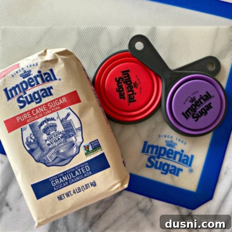Imperial Sugar products and branded measuring tools displayed next to Never Fail Fudge ingredients.