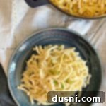 Polish Noodles and Sauerkraut 13 Polish Noodles & Kraut - kluski kapusta kiszona on a blue plate