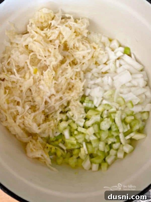 Polish Noodles and Sauerkraut 8 Sautéing onions, sauerkraut, and celery in butter in a Dutch oven.