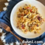 Overhead of Five Bean Ground Beef & Noodle Skillet Casserole on a white plate