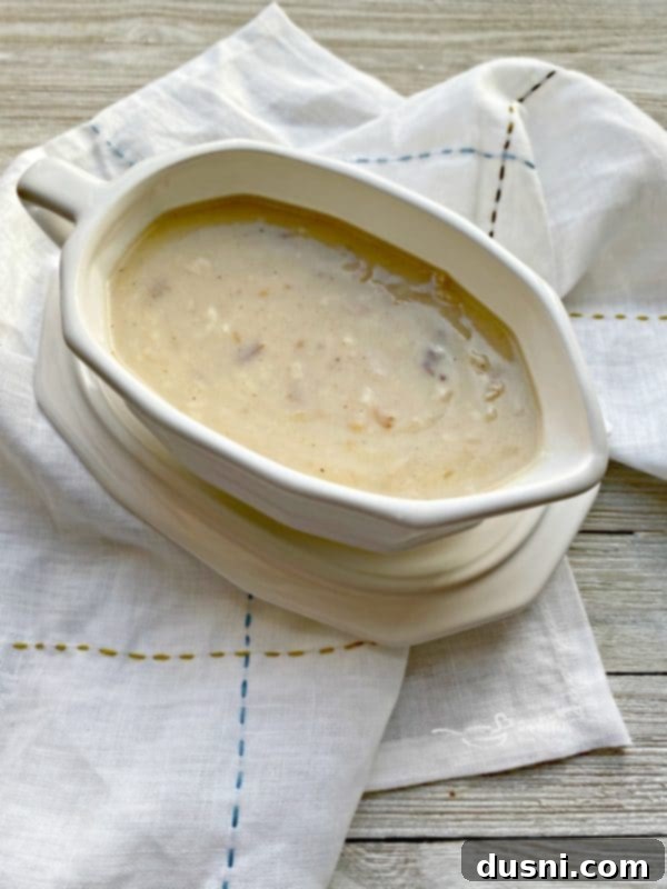 Perfect Turkey and Gravy: A Chef's Secrets 7 Homemade turkey gravy in a gravy boat, ready to be served