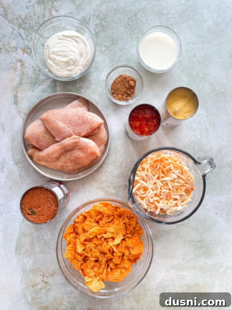 Another appetizing shot of the Chicken and Doritos Casserole with a serving removed.