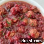 Dorothy Cranberry Meatballs 12 Dorothy's Cranberry Meatballs in a bowl, a perfect hot appetizer.