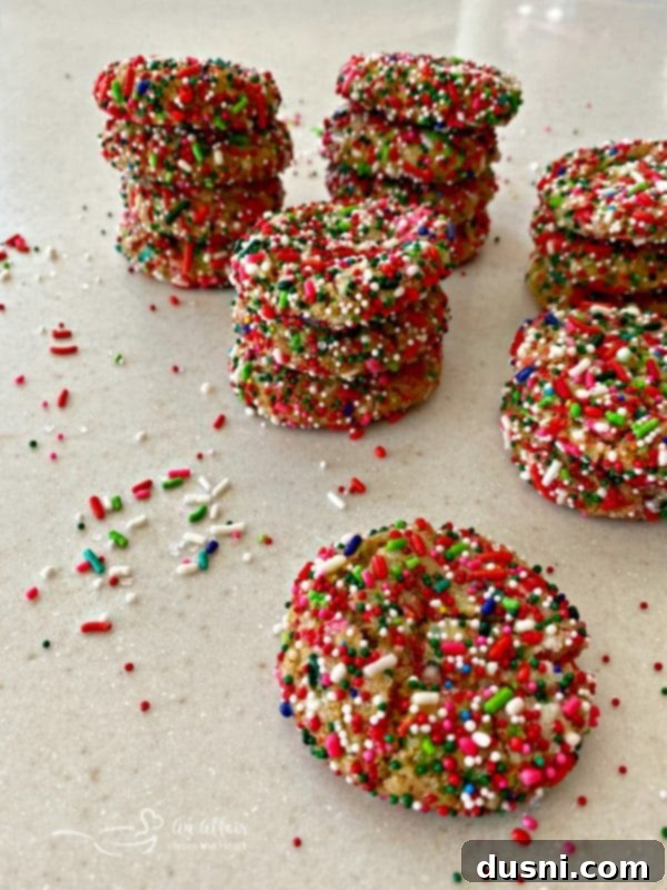 Festive Funfetti Sugar Cookies 16 Stacked Funfetti Sugar Cookies showing their colorful exterior and delicious texture