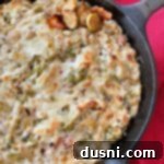 Cheesy Brussels Sprouts Dip in a skillet