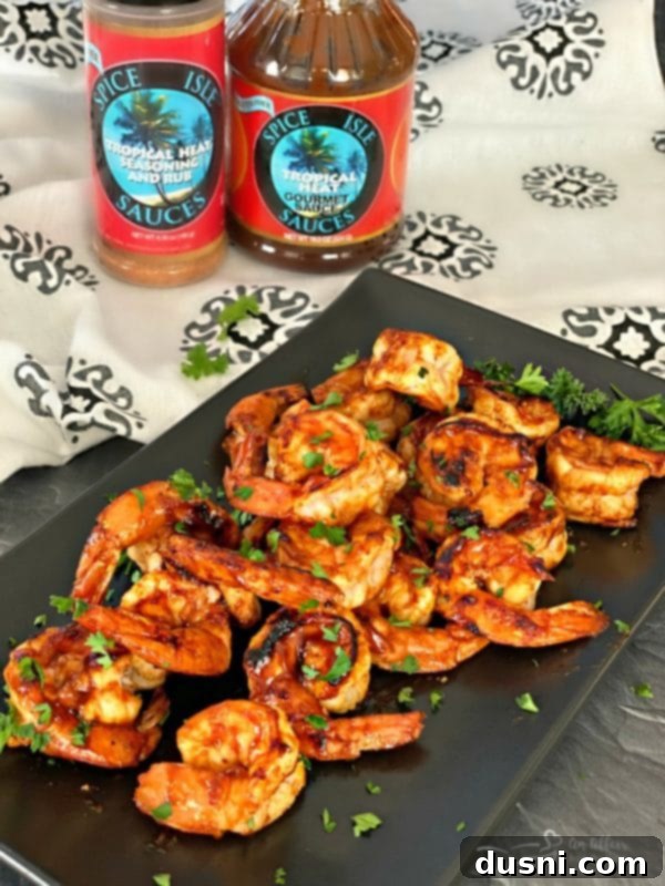 Spicy Caribbean Shrimp Appetizer with Spice Isle Sauces in background