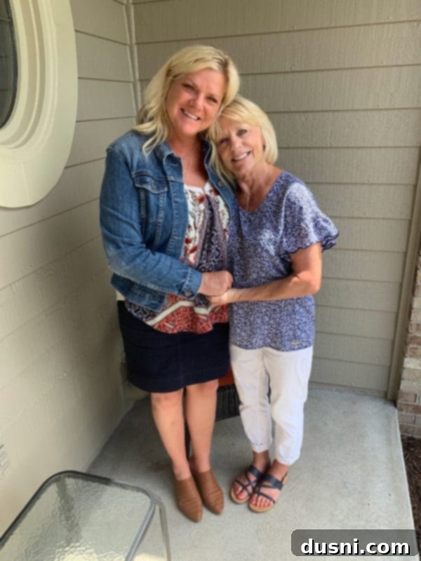 The author with her mother in 2019, sharing a warm embrace and cherished moment.