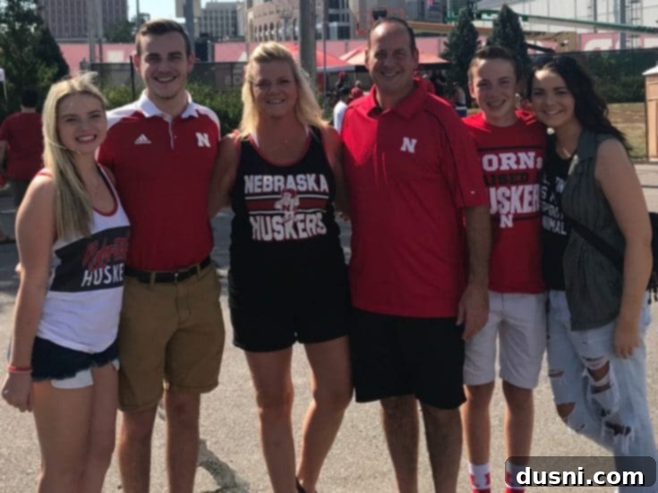 A family photo depicting joyful togetherness, symbolizing the core theme of bringing families together.