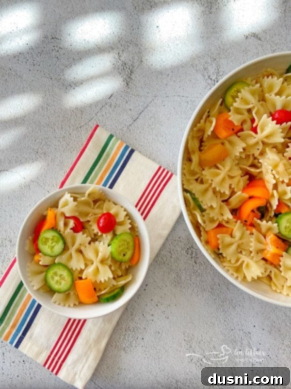 Easy French Vinaigrette Pasta Salad in big and small bowls