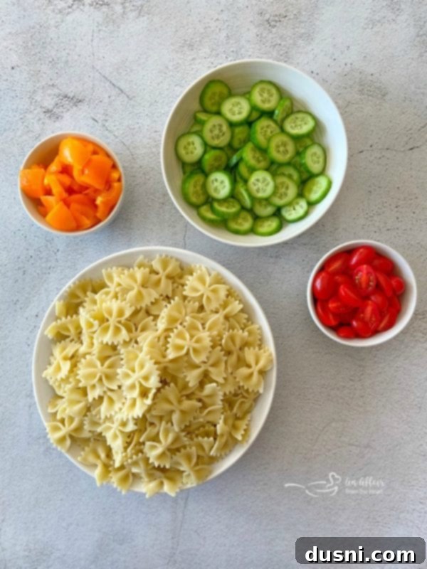 Ingredients being prepped for Easy French Vinaigrette Pasta Salad
