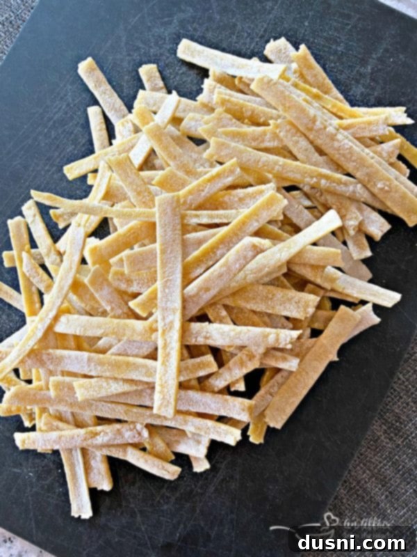 Dried homemade egg noodles ready to be cooked