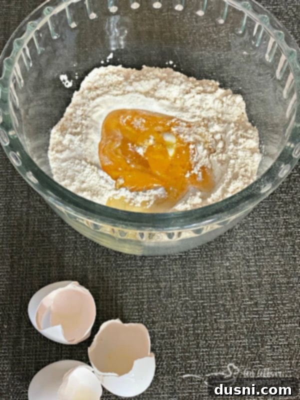 Ingredients for homemade egg noodles laid out