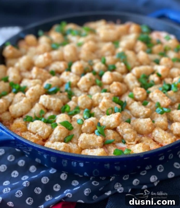 Bold Sausage, Mushroom and Golden Tot Bake 4 Spicy Tater Tot Casserole with Sausage & Mushrooms side view
