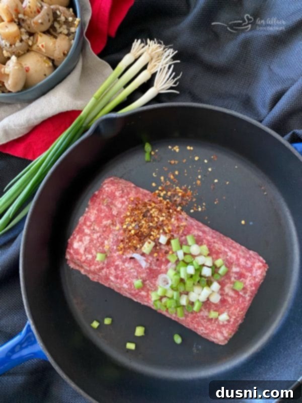 Bold Sausage, Mushroom and Golden Tot Bake 5 Spicy Tater Tot Casserole with Sausage & Mushrooms prep