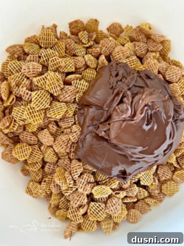 Crispix cereal in a bowl before chocolate coating