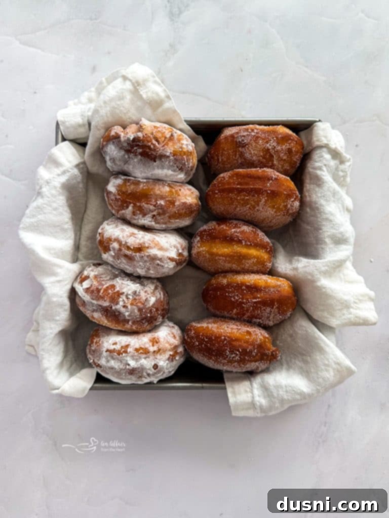 Pile of Paczki on a platter