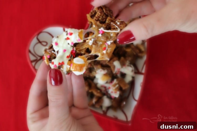 A close-up of Better Than Sex Chex Mix, showing its inviting texture and delicious layers.