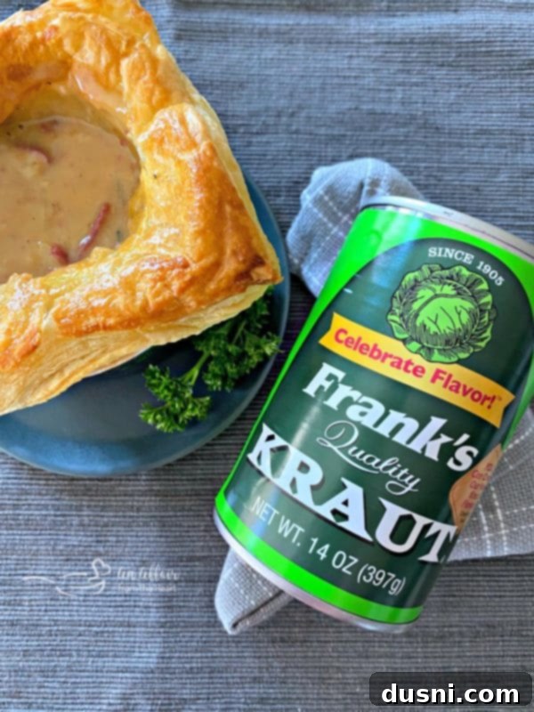 Opened Reuben Pot Pies revealing the delicious interior with corned beef, vegetables, and Frank's Kraut.