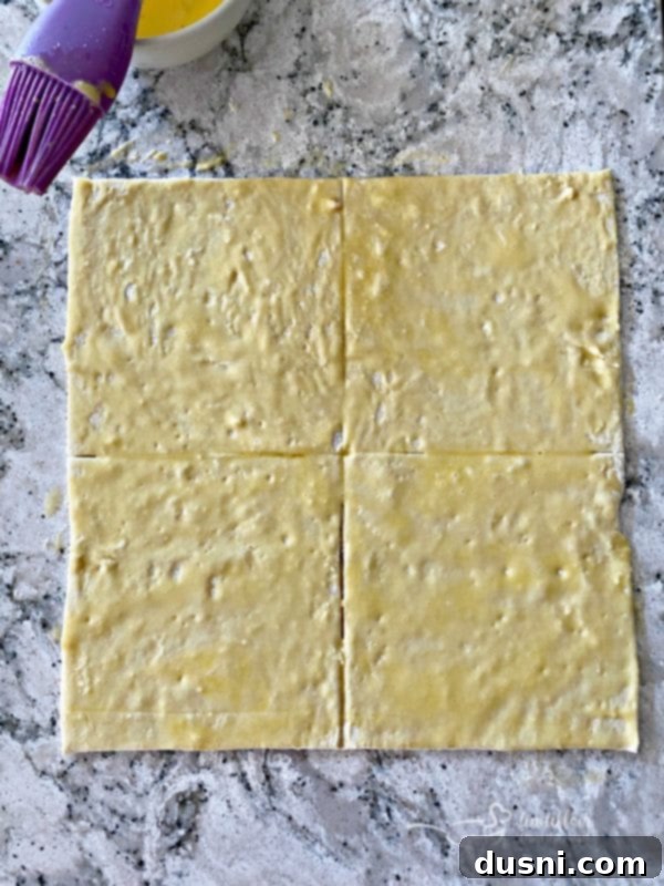 Puff pastry sheet prepared for topping the Reuben Pot Pies.