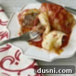 overhead of Stuffed Cabbage Rolls on a white plate