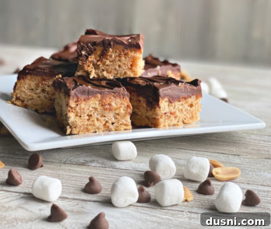 Pantry Perfection Bars 2 Stacked Homemade Whatchamacallit Bars with chocolate on top