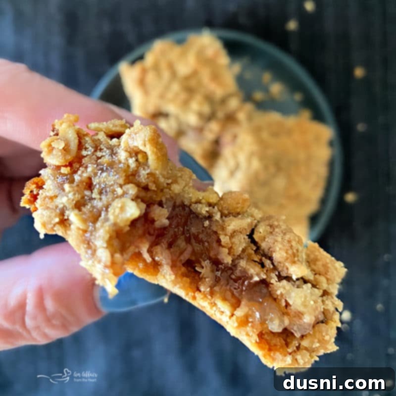 Sweet-Tart Rhubarb Crumble Bars 11 Freshly baked Rhubarb Crumble Bars, golden brown and bubbly