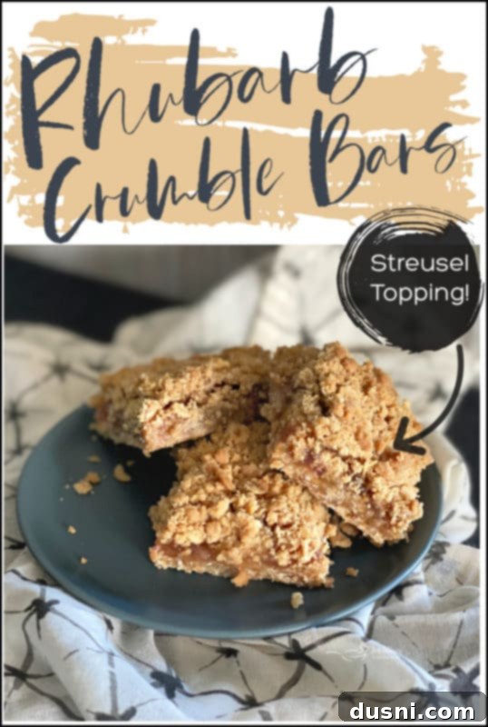 Sweet-Tart Rhubarb Crumble Bars 12 Rhubarb Crumble Bars, cut and presented in a stack