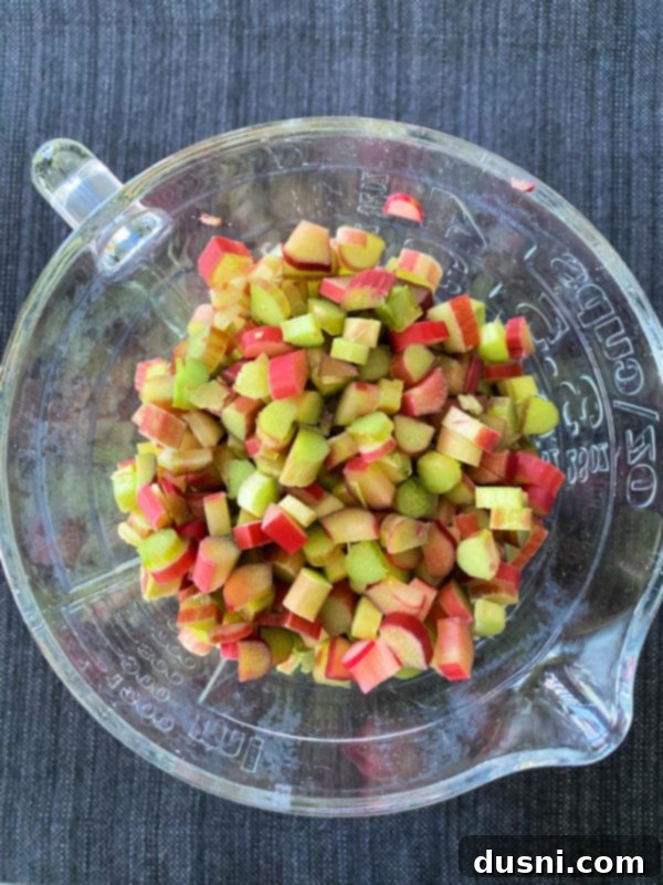 Sweet-Tart Rhubarb Crumble Bars 3 Close-up of Rhubarb Crumble Bars on a cooling rack